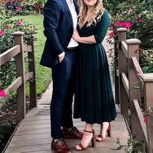 Size 2 bridesmaid dress in forest green. Sleeves stop mid-forearm.